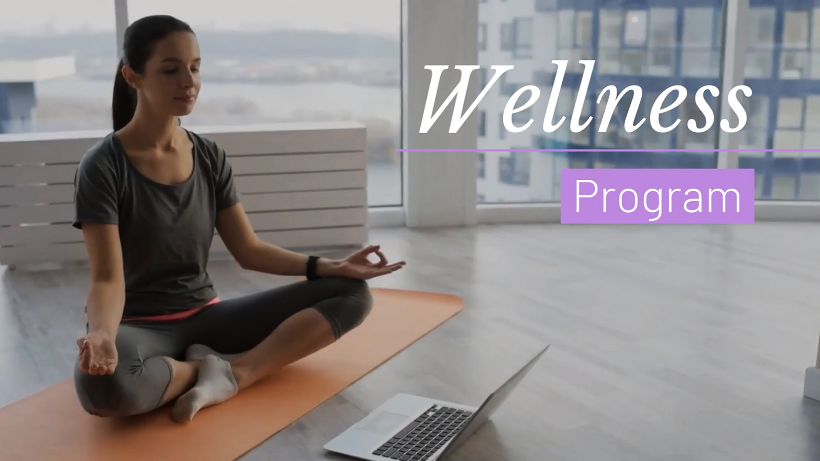 Woman practicing yoga in a serene indoor space with text overlay "wellness program" made with Biteable video maker.